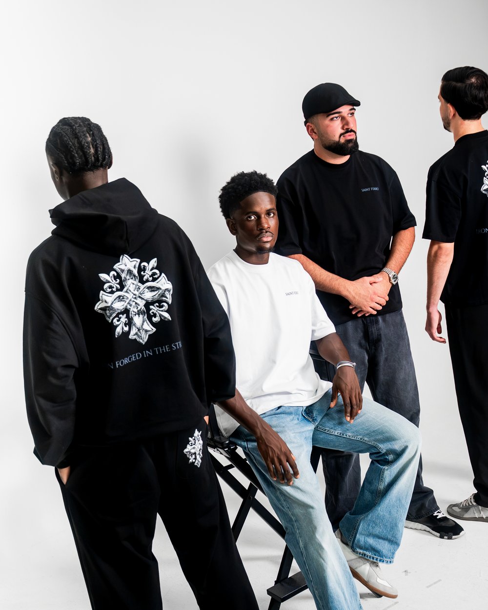 The Forge Hoodie Ferro Black, back print — the crew