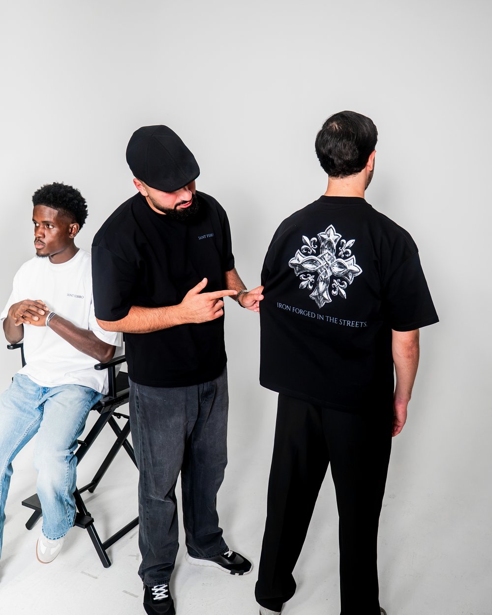 The Forge Tee Ferro Black, back print — the crew